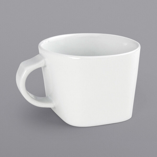 A white coffee mug with a handle.