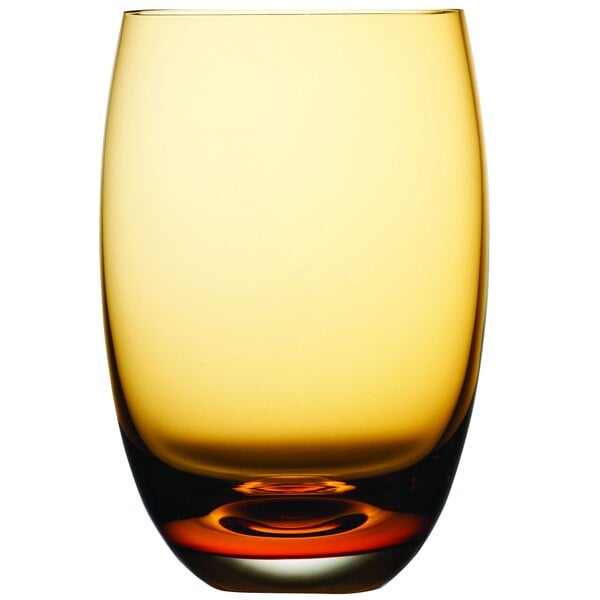 A nude coloured amber tumbler with a yellow rim.
