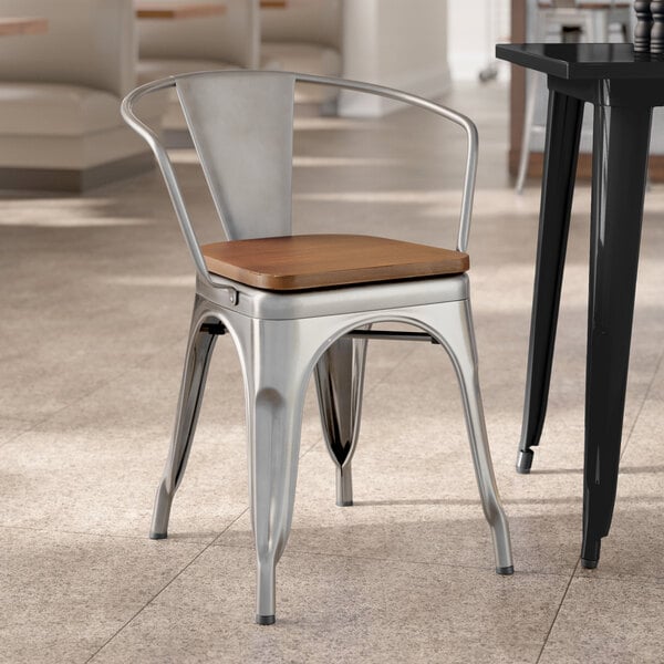 Lancaster Table & Seating Alloy Series Clear Indoor Arm Chair with Walnut Wood Seat
