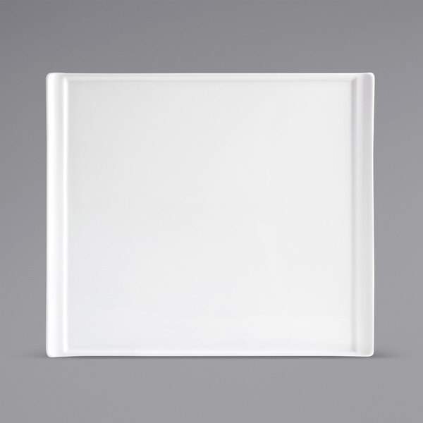 A white rectangular porcelain plate with a white border.