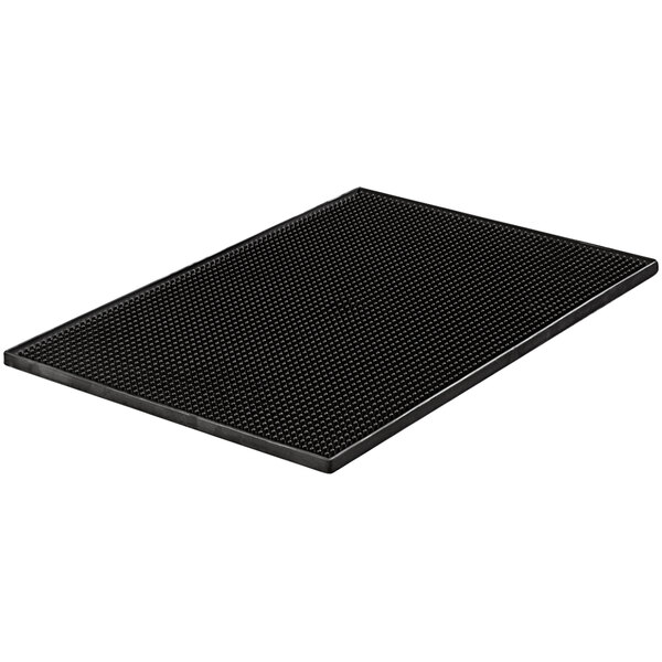 A Carlisle black rubber service mat with small holes.