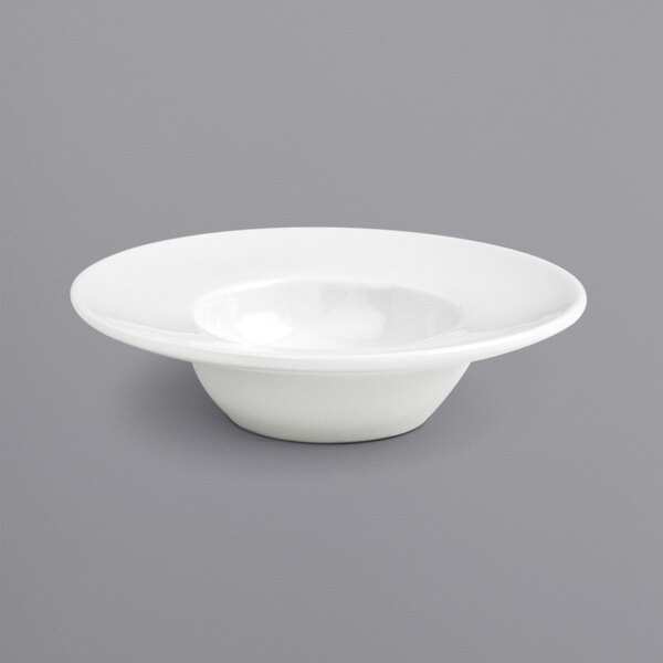 A white bowl with a wide white rim.