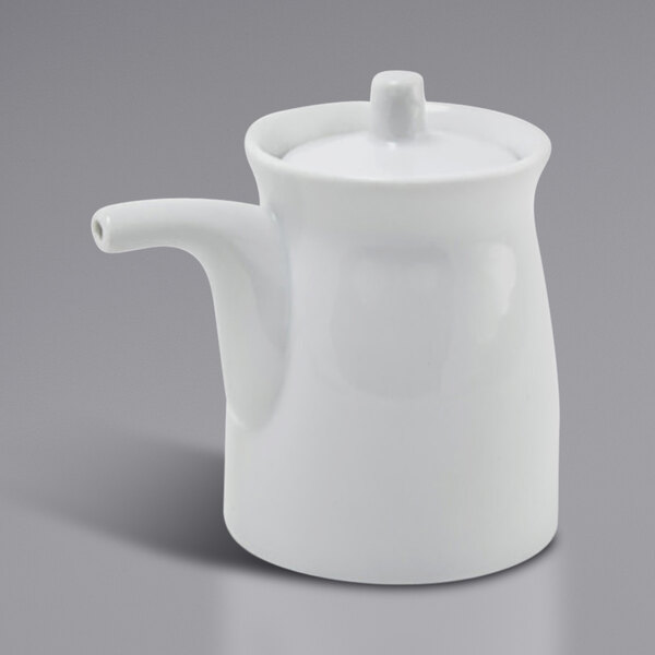 A Front of the House bright white porcelain pourer with a lid and spout.