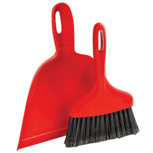 A red Libman dustpan and brush.