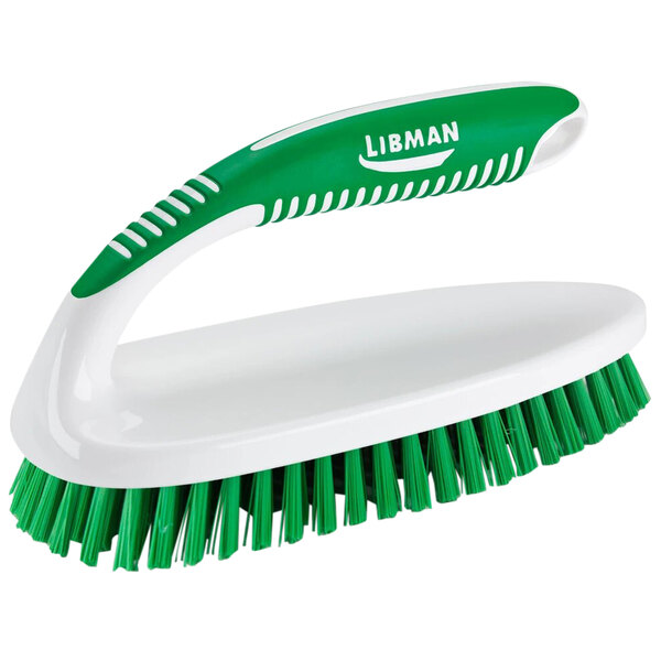 A green and white Libman Big White scrub brush with a handle.