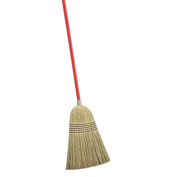 A Libman janitor corn broom with a red handle.