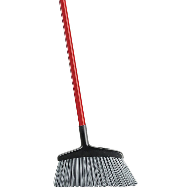 A red and black Libman rough surface angle broom with a red handle.