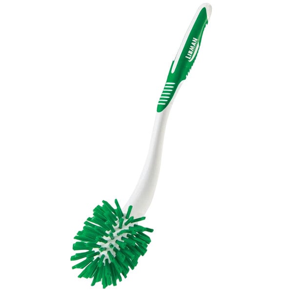 A green and white Libman toilet brush with an angled head.