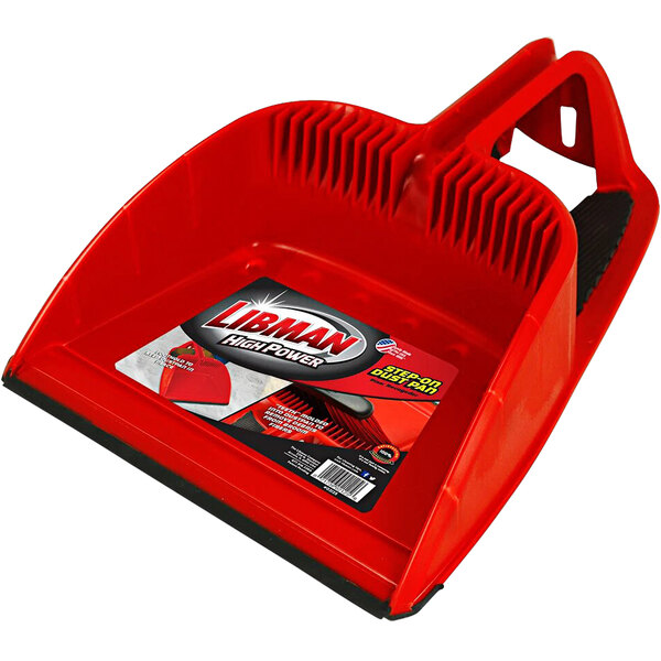 A red plastic dustpan with a black handle.