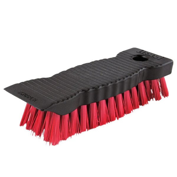 A Libman black and red scrub brush with a red handle.