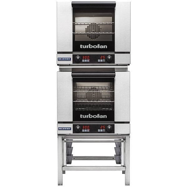 A stack of two Moffat Turbofan double deck electric convection ovens.