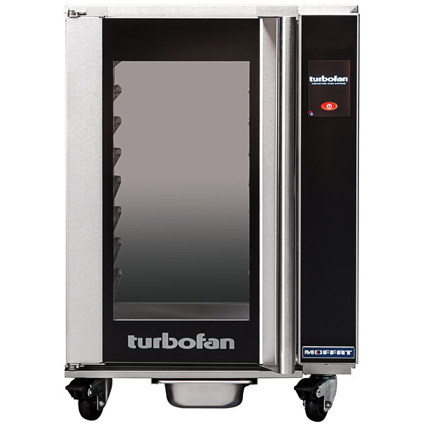 A large black and silver Moffat Turbofan holding cabinet with a door.