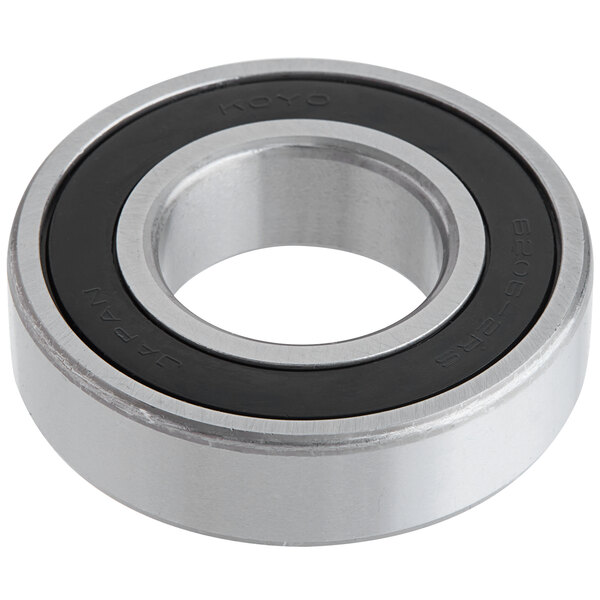 A close-up of an Estella bearing with a black rubber seal.