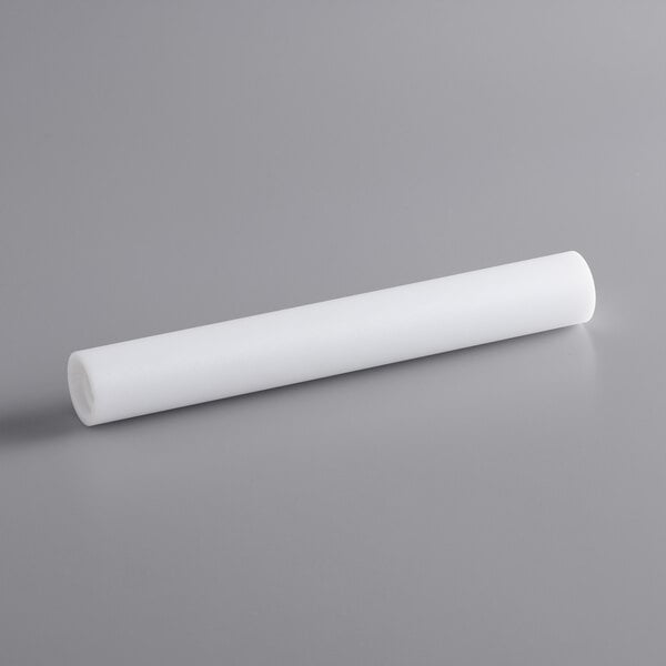 A white cylindrical roller for Estella dough sheeters on a gray surface.