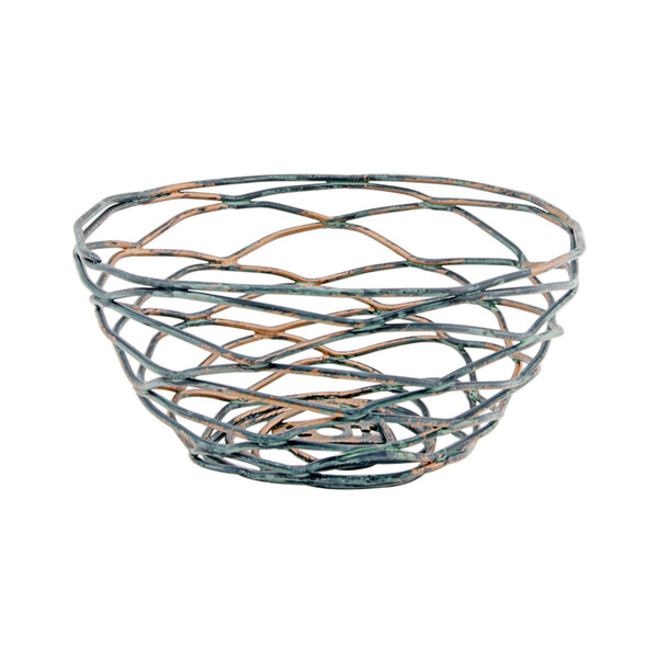 A Front of the House hand-painted fused iron round basket with a wire handle decorated with green and brown lines.