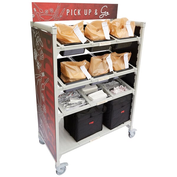 A Cambro Camshelving Premium Flex Station cart with food items in plastic bags on it.