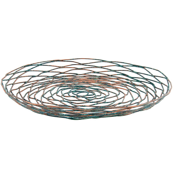 A Front of the House wire basket with a hand-painted spiral design on iron.