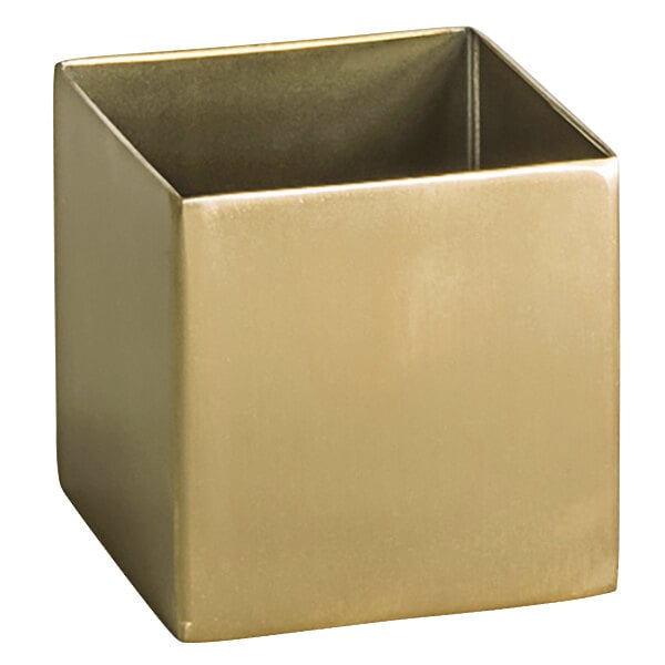 A gold square stainless steel ramekin.