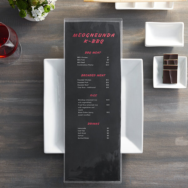 A menu on a table in a steakhouse.