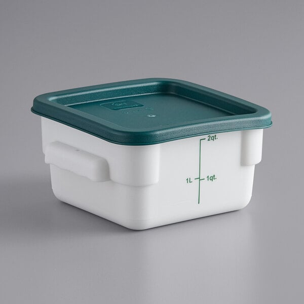 A white square polypropylene food storage container with a white and green lid.