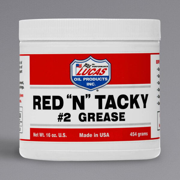 A white Lucas Oil tub of Red N Tacky grease with red and white labels.