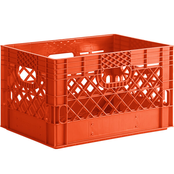 An orange plastic rectangular milk crate with handles.