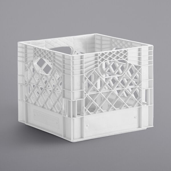 A white plastic milk crate with holes.