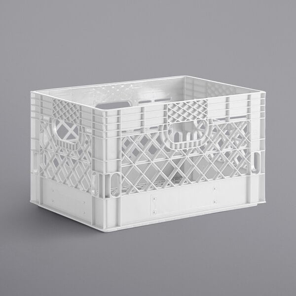 A white plastic rectangular milk crate with a handle.