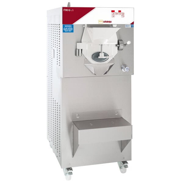 A stainless steel Cattabriga commercial ice cream machine on wheels.