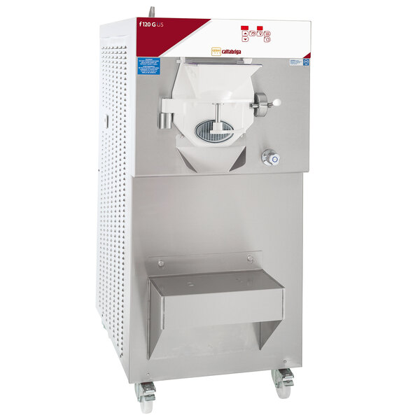 A Cattabriga commercial ice cream machine with a stainless steel base and white cover on wheels.