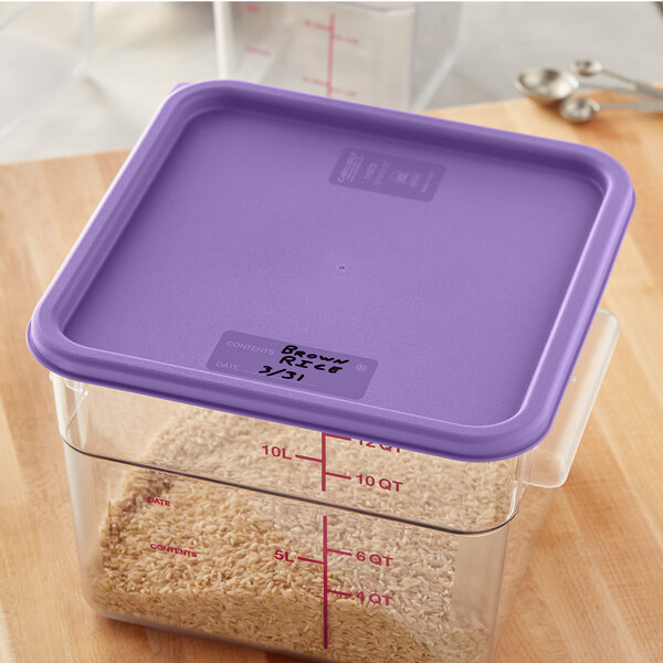 A Carlisle purple plastic storage container with a purple lid.