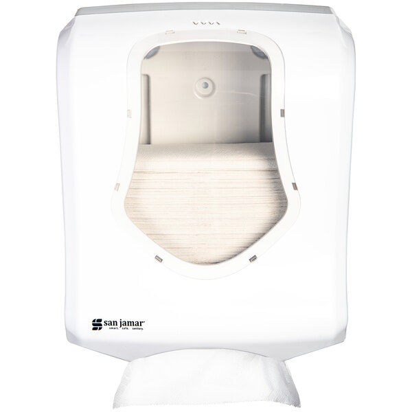 A San Jamar white and clear paper towel dispenser with a roll of paper inside.