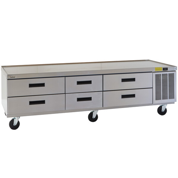 A Delfield stainless steel chef base with six refrigerated drawers.
