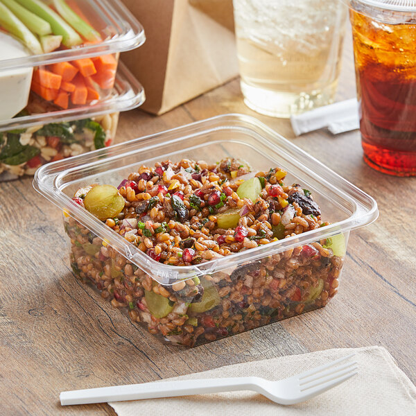 A Dart TamperGuard deli container filled with vegetables.