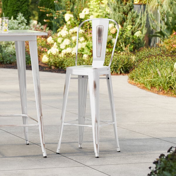 Lancaster Table & Seating Alloy Series Distressed White Outdoor Cafe Barstool
