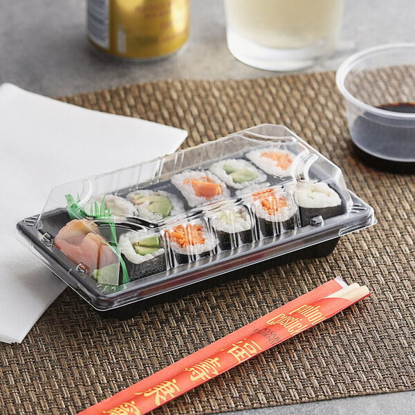 Emperor's Select small plastic container of sushi with lid.