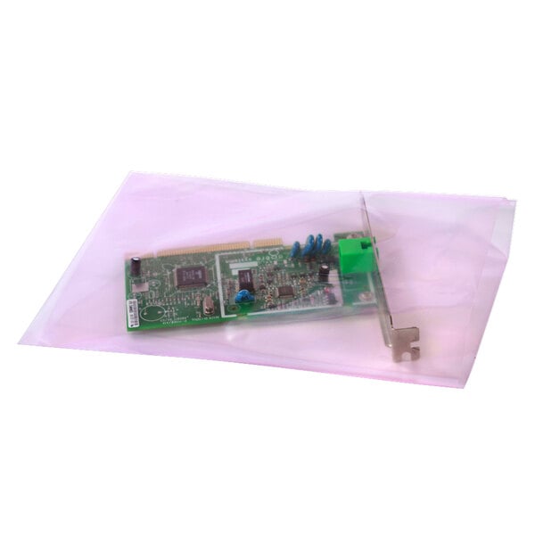 A green circuit board in a clear plastic Lavex anti-static bag.