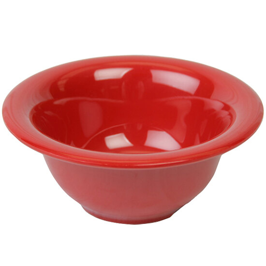 A close up of a red Thunder Group melamine soup bowl.