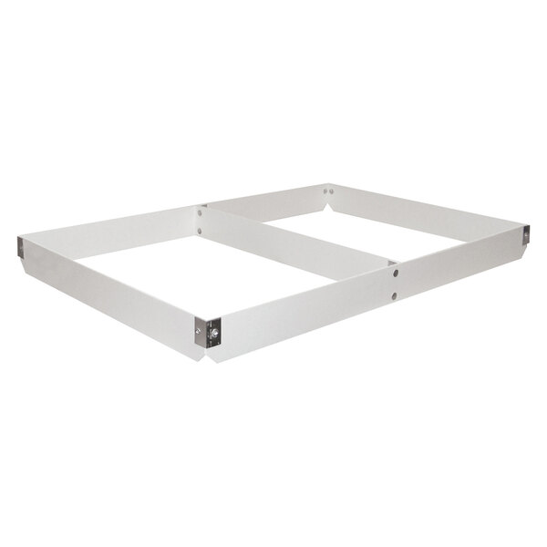 A white rectangular MFG Tray fiberglass sheet pan extender divided lengthwise with metal bars.