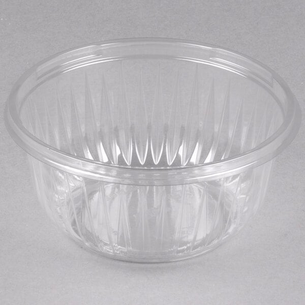 A Dart clear plastic bowl with a ribbed edge.