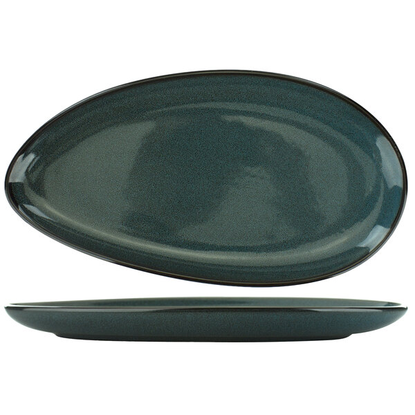 A close-up of a midnight blue oval porcelain platter with a black rim.