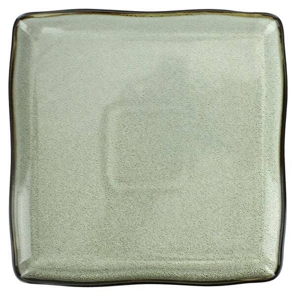 A square porcelain plate with a black rim.