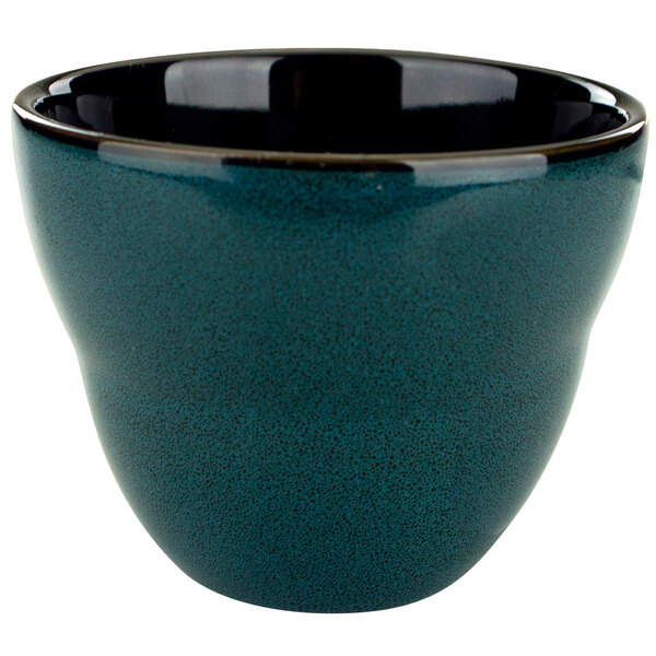 A midnight blue porcelain bouillon bowl with a black rim.