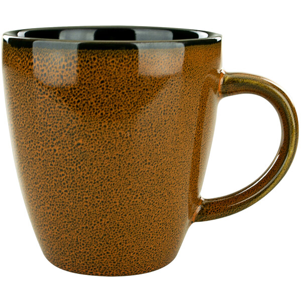 An International Tableware terracotta mug with a black rim.
