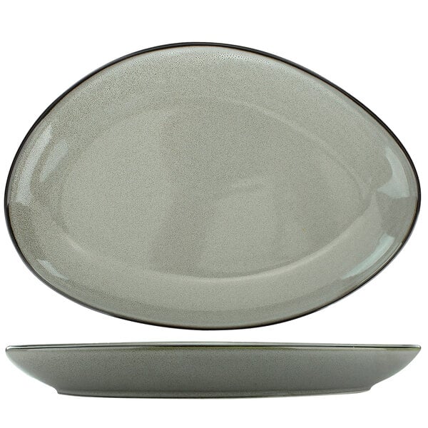A white oval porcelain platter with a black rim.