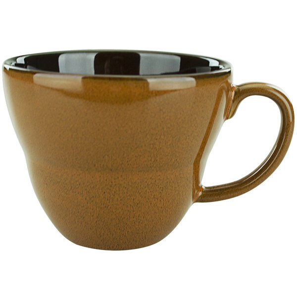 A brown terracotta porcelain cup with a black rim and handle.