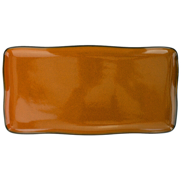 A close-up of a rectangular terracotta International Tableware platter with black edges.