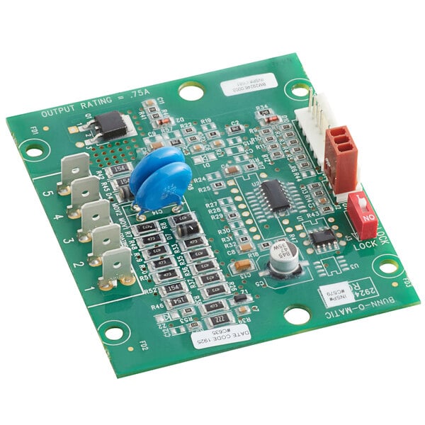 A green circuit board for a Bunn coffee brewer with many different components.