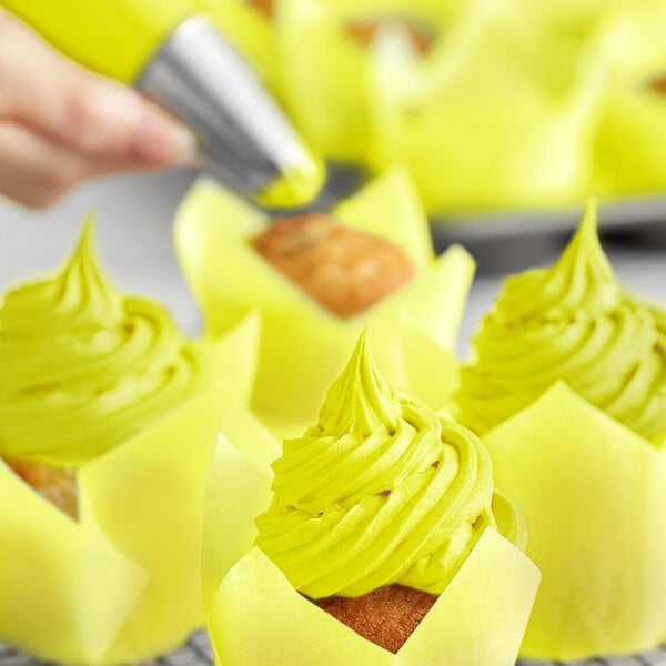 Yellow cupcakes with Chefmaster Neon Brite Yellow frosting.