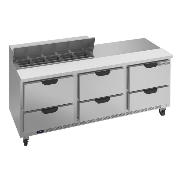 A Beverage-Air 6 drawer refrigerated sandwich prep table on a stainless steel counter.